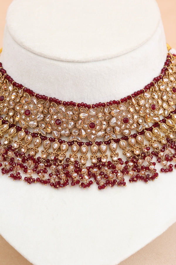 Maroon Statment Choker With Attached Pendants. Also Earrings With Jhumka And Saharey Attached And Tikka (CS026-M-Polki)