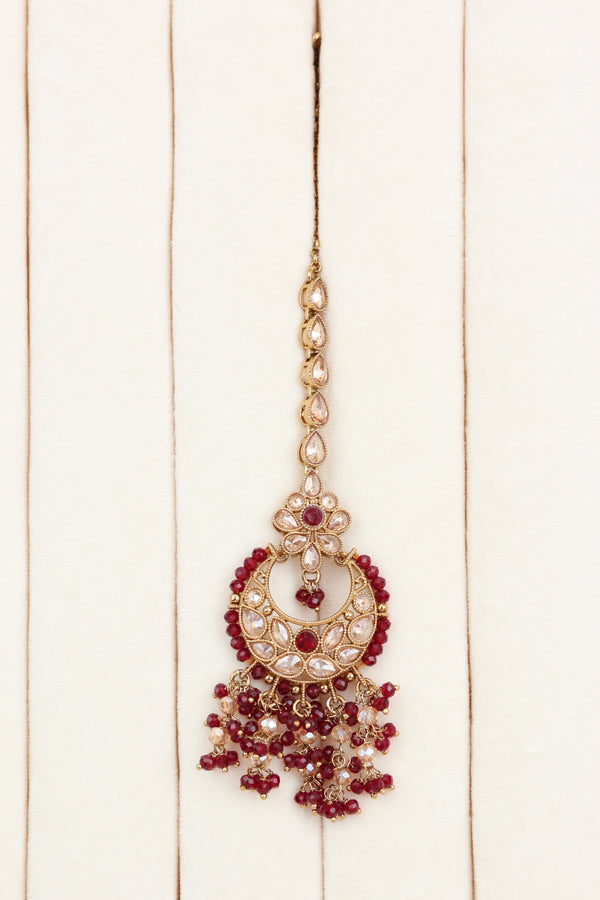 Maroon Statment Choker With Attached Pendants. Also Earrings With Jhumka And Saharey Attached And Tikka (CS026-M-Polki)