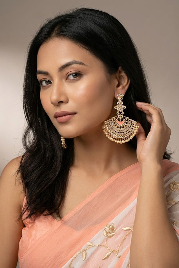 Long Fashionable Dangler Earrings In A Slightly Peach Color Attached With Stones And Pearls
