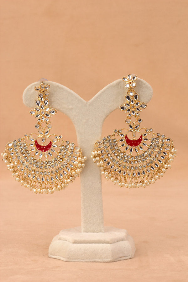 Long Fashionable Dangler Earrings In A Slightly Red Color Attached With Stones And Pearls (E004-R-B1)