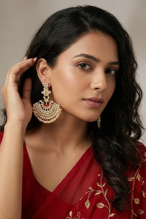 Long Fashionable Dangler Earrings In A Slightly Red Color Attached With Stones And Pearls