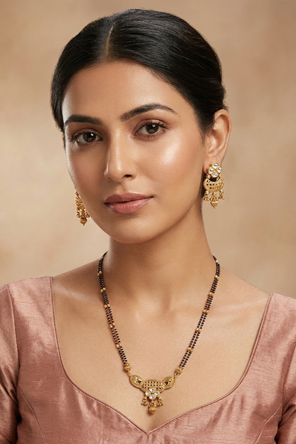 Mangalsuta With Kundan And Gold Plated Also Matching Earrings With Beads Attached