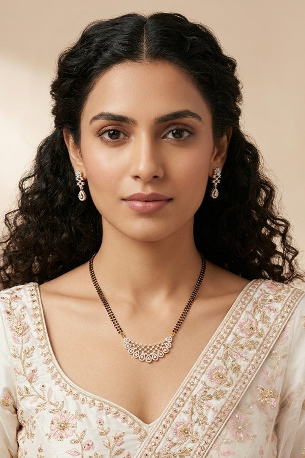 Mangalsutra With Short Chain In Gold Polish And With American Diamonds Also With Small Earrings