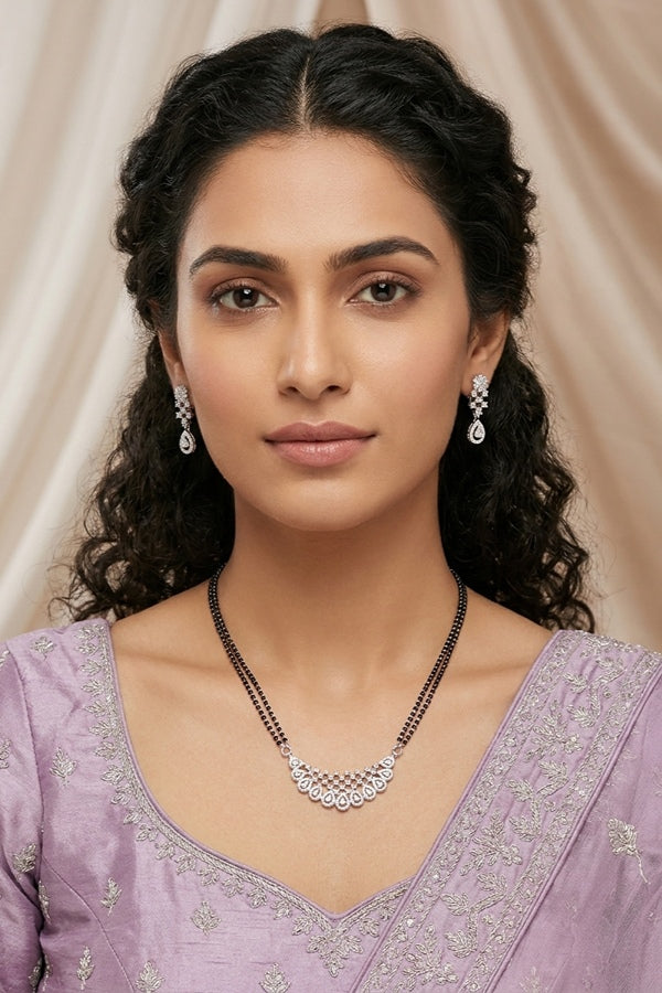 Mangalsutra With Short Chain In Silver Polish And With American Diamonds Also With Small Earrings