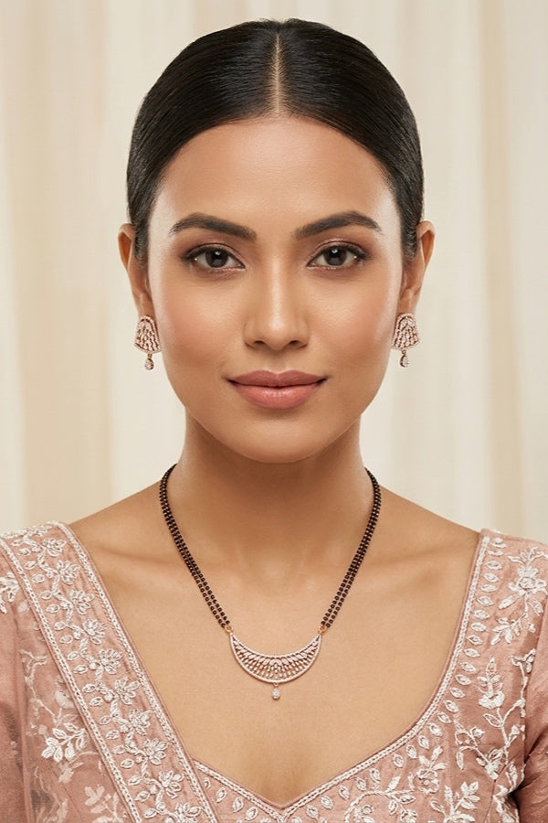 Gold Polish Mangalsutra With Short Double Chain And American Diamonds And Small Studs