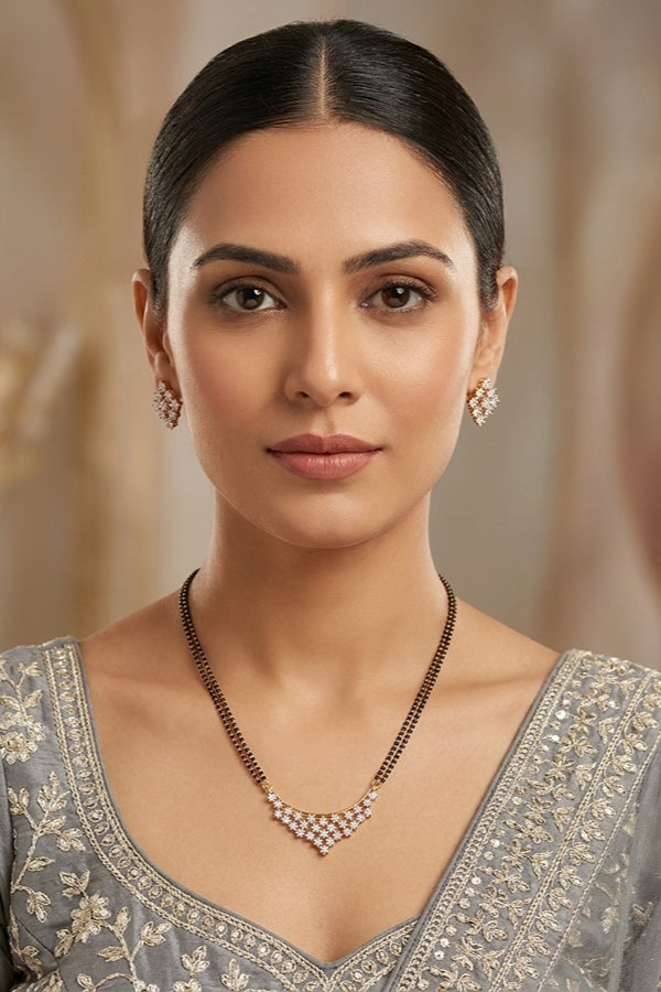 Double Chain Mangalsutra in Gold Polish With American Diamonds And Matching Studs
