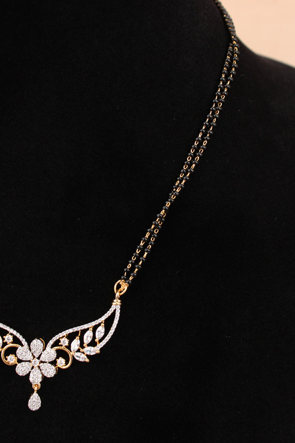 Mangalsutra In Gold Polish With American Diamonds And Small Earrings (MS019-G)