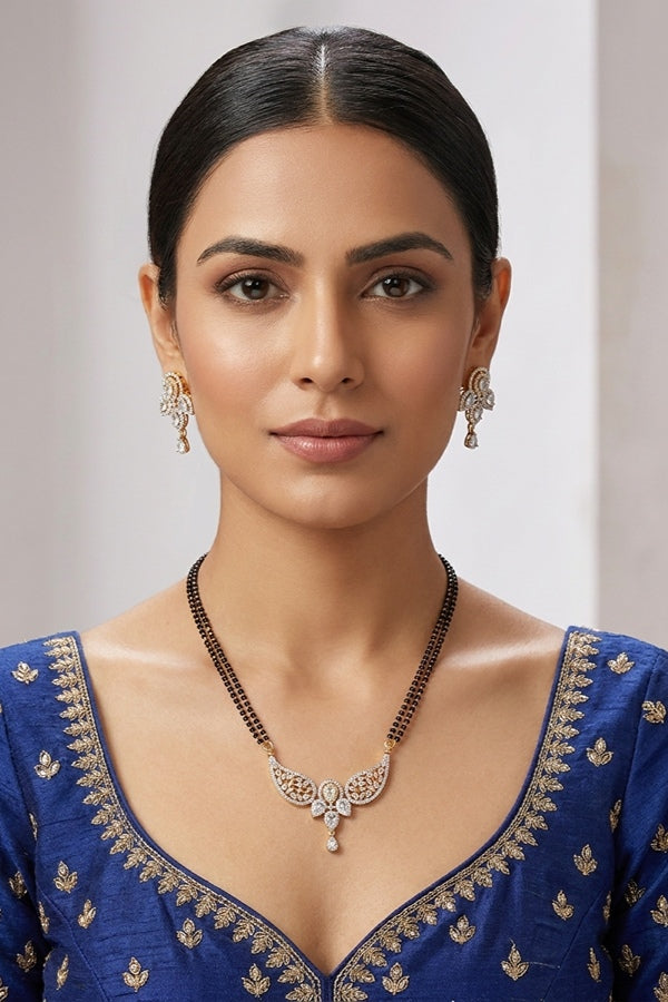 Gold Polish Mangalsutra With American Diamonds And Center Pendant With Small Earrings
