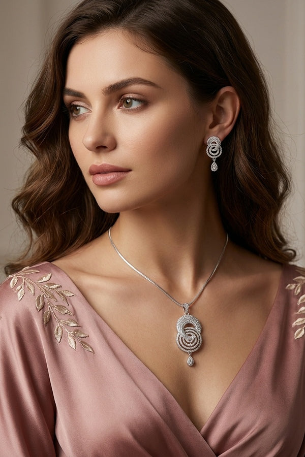 Silver Polish Pendant Set With American Diamonds And Matching Earrings