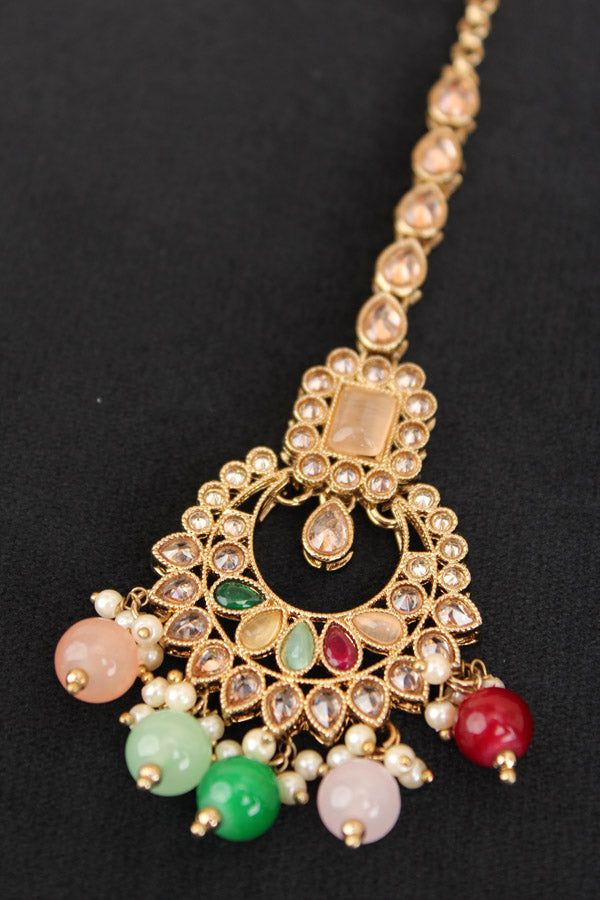 Reverse AD Tikka With Colourful Stones And Pearls With Center Peach Stone (T002-PE-Polki)
