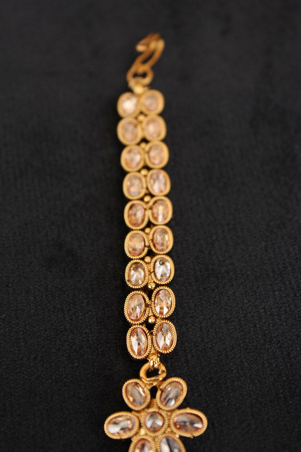 Tikka In Gold Polish With Polki Stones And Ruby Colour Beads (T005-Polki)