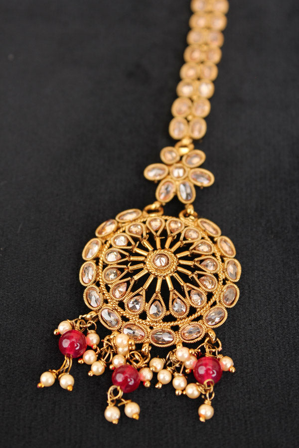 Tikka In Gold Polish With Polki Stones And Ruby Colour Beads (T005-Polki)