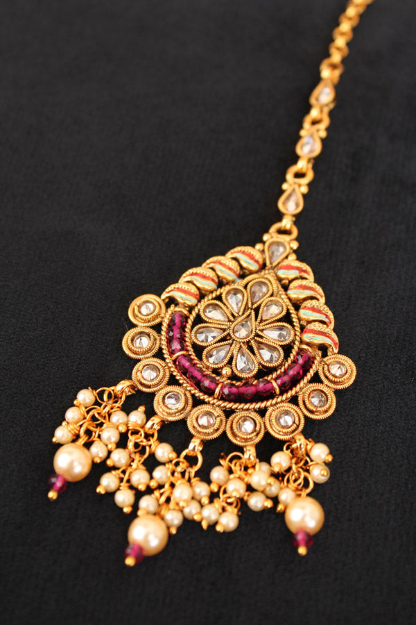 Tikka In Gold Polish With Reverse AD Stones And Purple Crystal Beads (T010-PU-Polki)