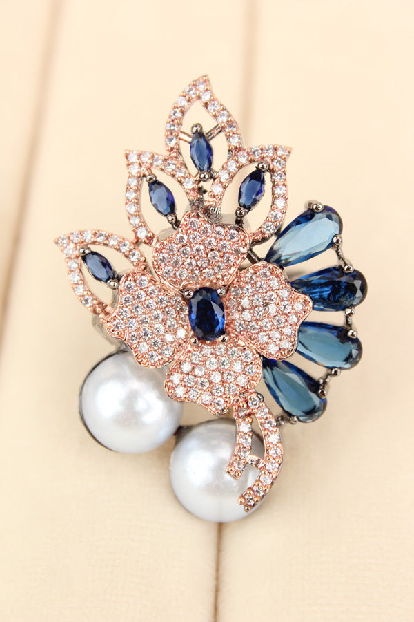Adjustable American Diamond Ring With Flower Design And Pearls Attached In Blue (ADR003-B)