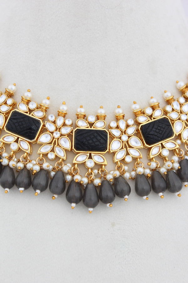 Black Kundan Necklace Set With Grey Pearls Attached Also With Matching Earrings And Tikka (IGNK011)