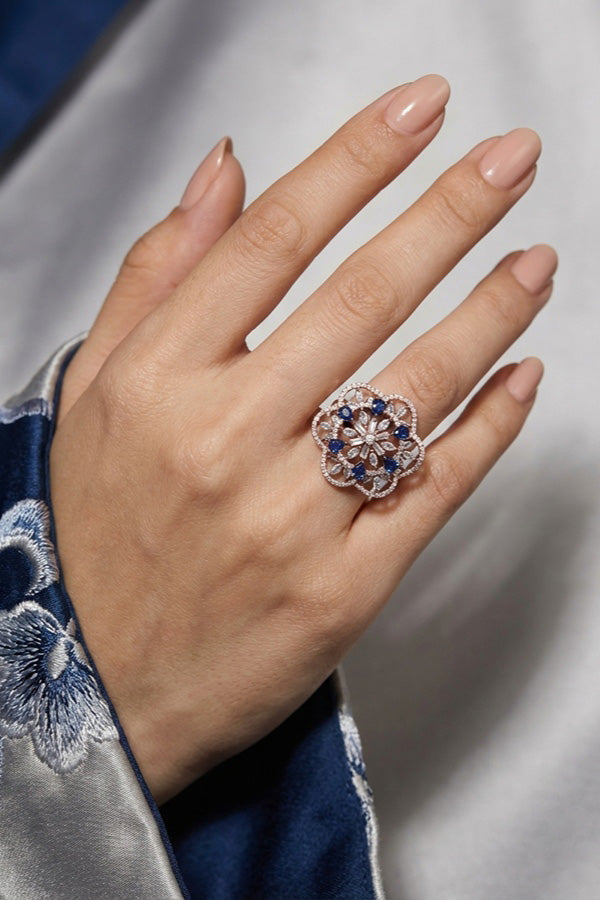 Double flower Design Adjustable Ring In Premium Quality With Blue Colour Stones (ADR007-B)