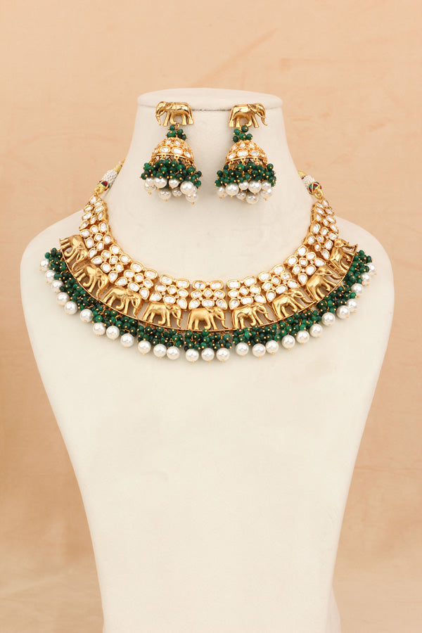 Elephant Motif Kundan Necklace Set With White Pearls And Green Beads Attached With Matching Jhumka Earrings (NKS034-G)