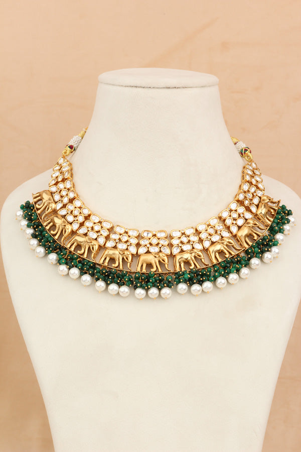 Elephant Motif Kundan Necklace Set With White Pearls And Green Beads Attached With Matching Jhumka Earrings (NKS034-G)