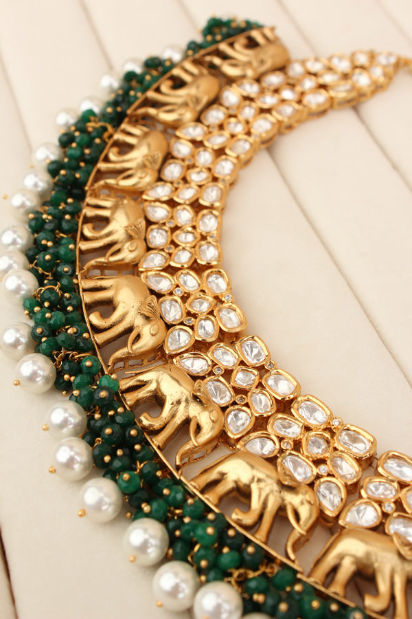 Elephant Motif Kundan Necklace Set With White Pearls And Green Beads Attached With Matching Jhumka Earrings (NKS034-G)