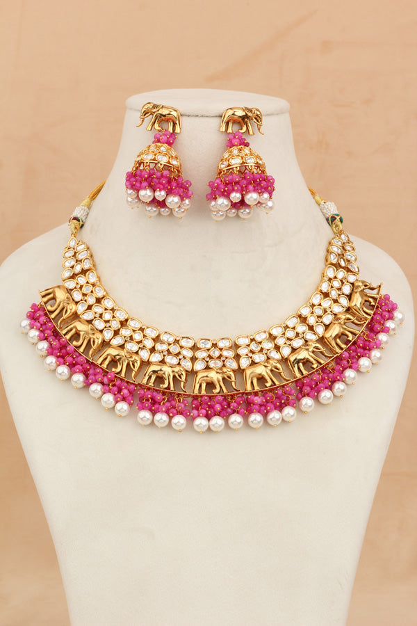 Elephant Motif Kundan Necklace Set With White Pearls And Pink Beads Attached With Matching Jhumka Earrings (NKS034-P)