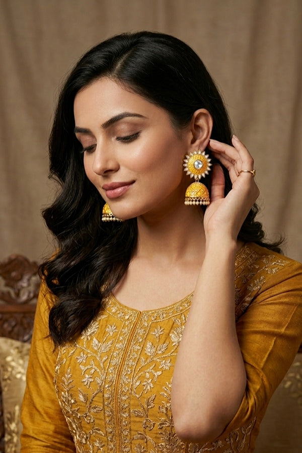 Fashionable Jhumka Earrings In Yellow Colour With White Beads Attached