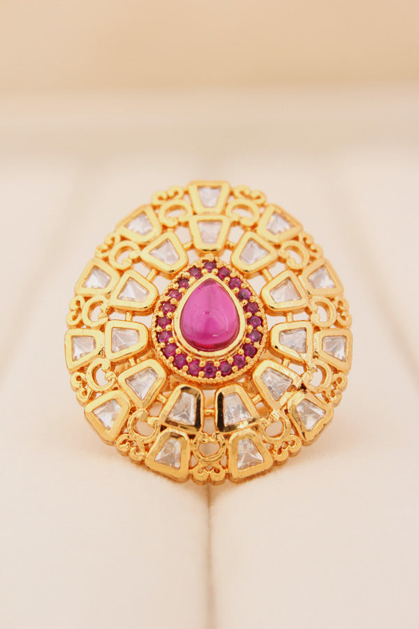 Gold plated Premium Quality Kundan Ring With Small Ruby Colour Stones And A Large Center Stone (KR012)