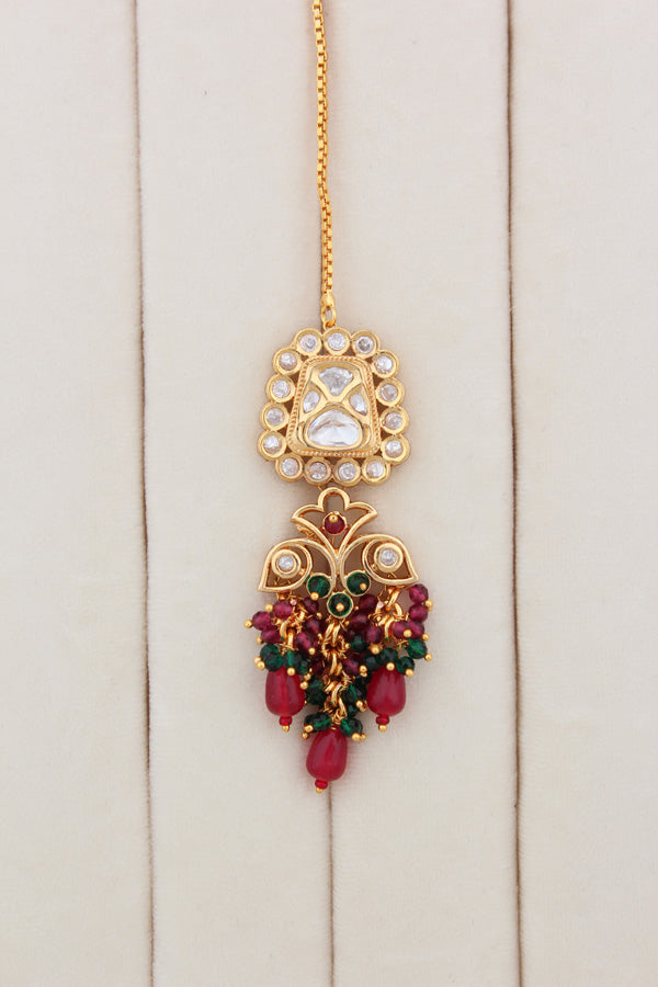 Kundan Necklace With American Diamonds And Red And Green Pearls With Earrings And Matching Tikka(NK003-G-K-B1)