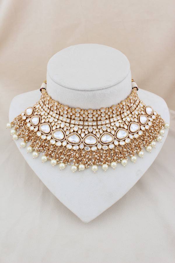 Necklace In Gold Polish With Kundan And White Pearls Attached Also Large Earrings And Tikka(NK004-GO-K-B1)