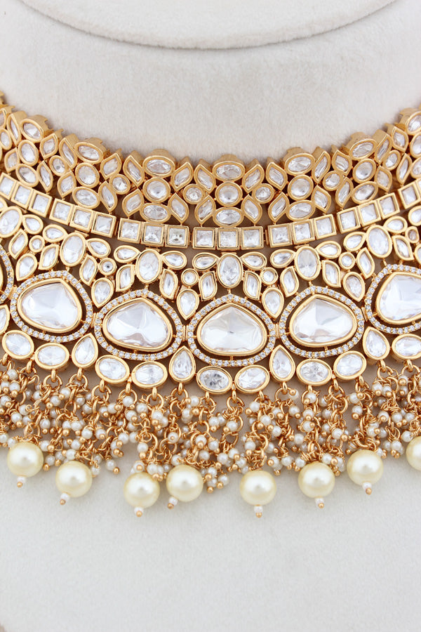 Necklace In Gold Polish With Kundan And White Pearls Attached Also Large Earrings And Tikka(NK004-GO-K-B1)