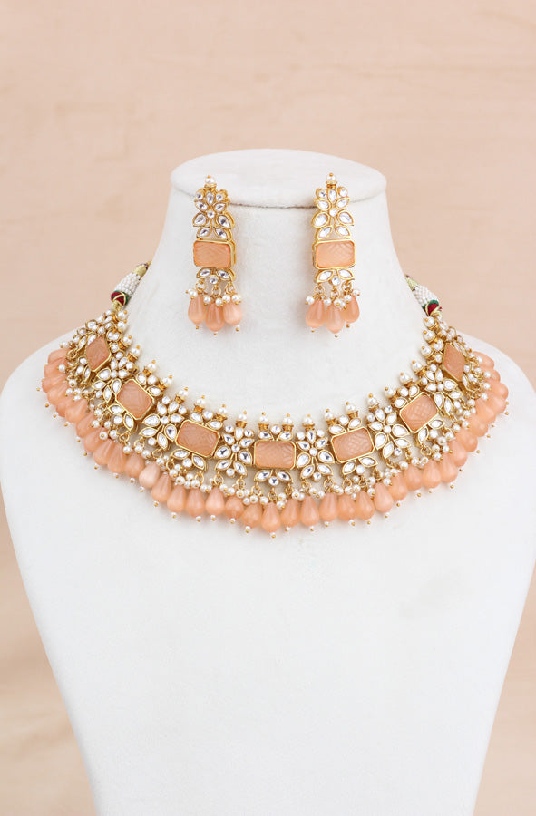 Peach Kundan Necklace Set With Matching Earrings And Tikka (IGNK011)