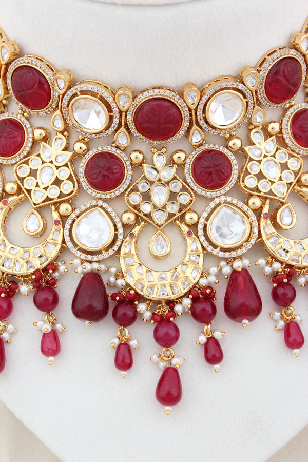 Premium Quality Kundan Set With American Diamonds And Ruby Color Pearls Attached With Matching Earrings And Tikka(NK005-RU-K-B1)