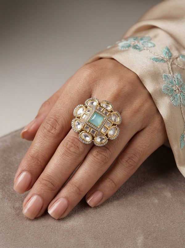 Silver Plated Quality Kundan Ring With Flower Design And Aqua Blue Colour Center Stone And Small American Diamonds