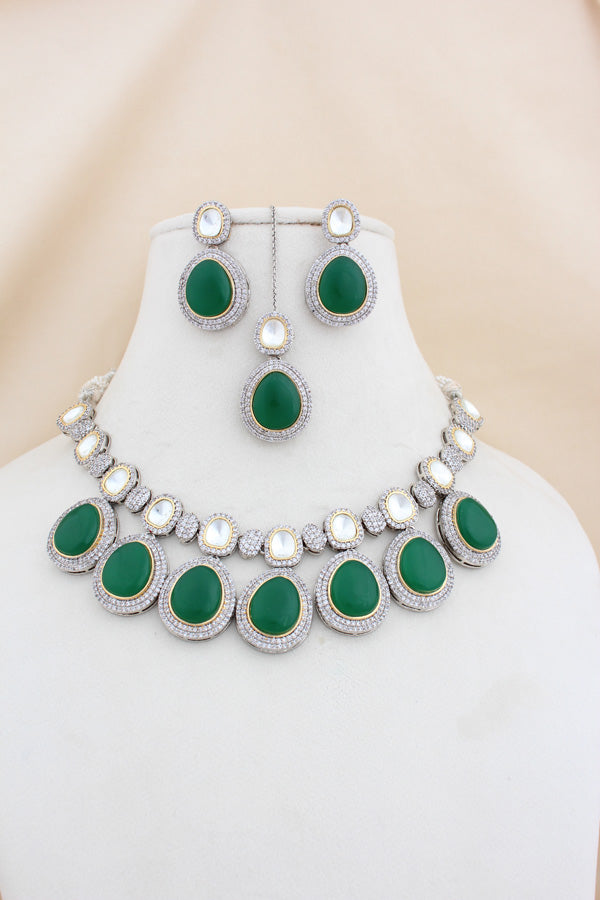 Silver Polish Kundan Necklace Set With Green Stones And Also Small Earrings And Tikka (NK026G-Kundan)