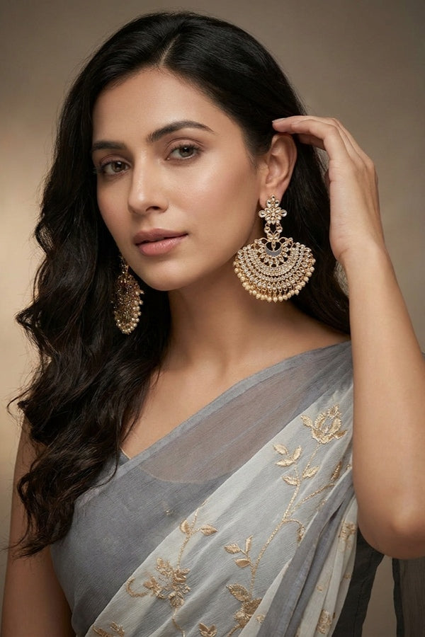 Long Fashionable Dangler Earrings In A Slightly Grey Color Attached With Stones And Pearls 