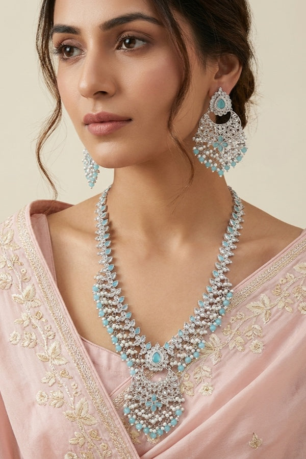 Sky Blue Long Necklace Set In Silver Polish With White Pearls. Also Large Matching Earrings And Tikka