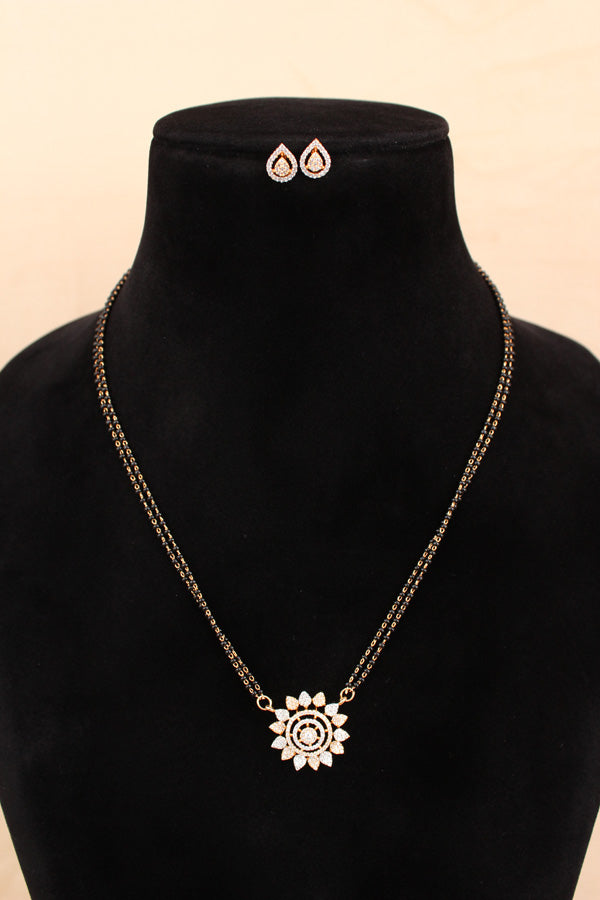 Long Mangalsutra With Flower Pendant In American Diamonds And Petite Tops (MS002)