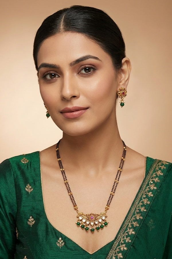Mangalsutra With Double Chain With Kundan And Green Beads Attached And Matching Small Earrings 