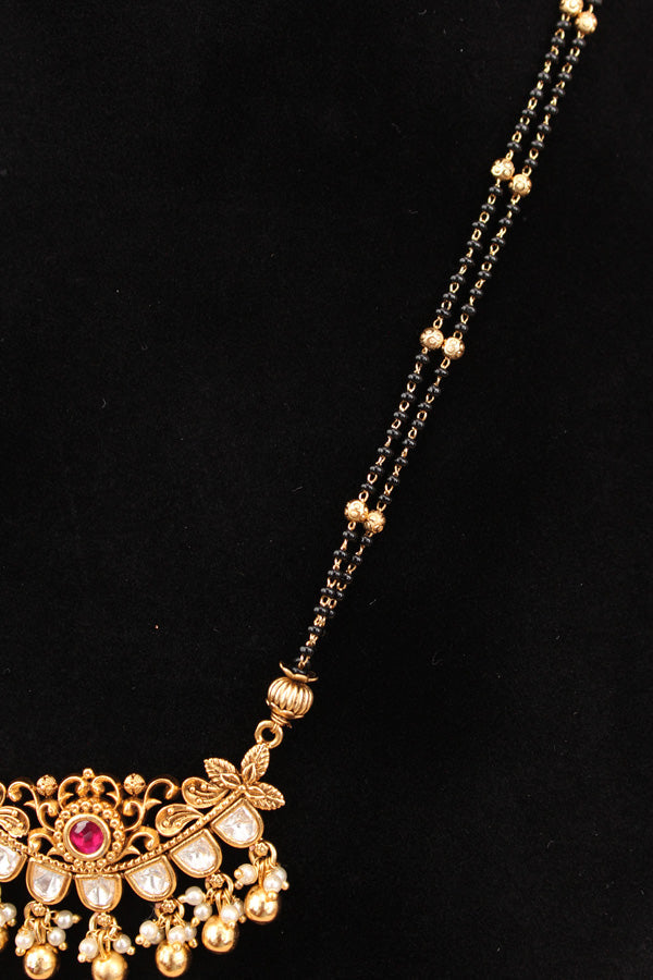 Mangalsutra With Double Chain With Kundan And Golden Beads  Attached With Ruby Colour Stones And Matching Small Earrings (MS004-RU)