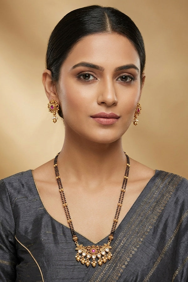 Mangalsutra With Double Chain With Kundan And Golden Beads Attached With Ruby Colour Stones And Matching Small Earrings