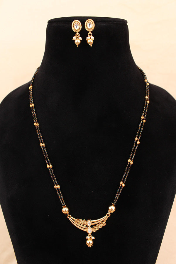 Mangalsutra In Double Chain With Kundan And Gold Pearl Attached Also Small Earrings (MS005)
