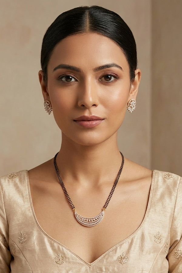 Long Mangalsutra In Gold Polish With American Diamonds And Small Studs