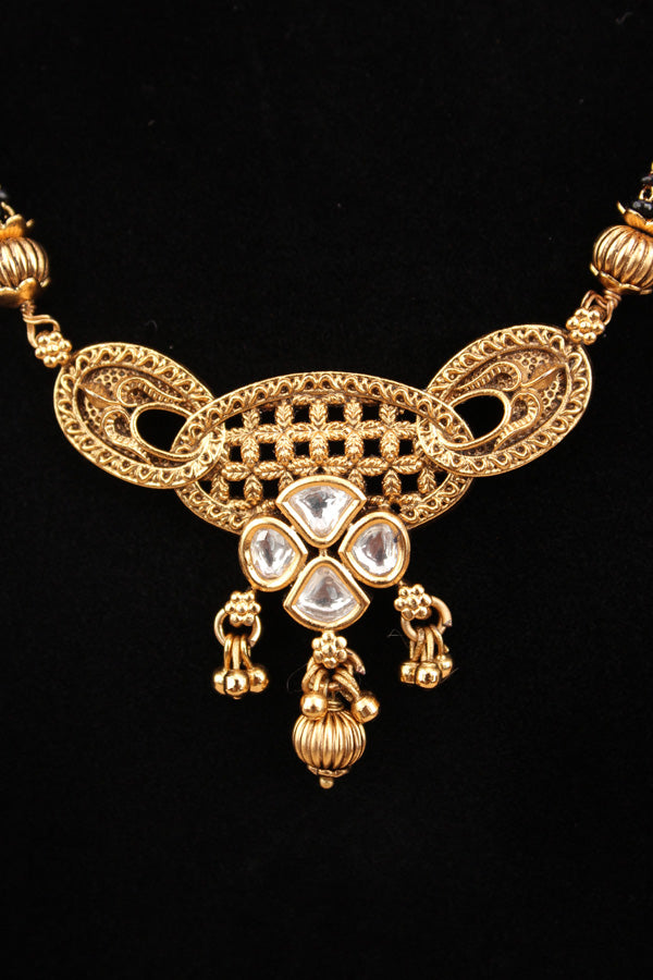 Mangalsuta With Kundan And Gold Plated Also Matching Earrings With Beads Attached (MS011)