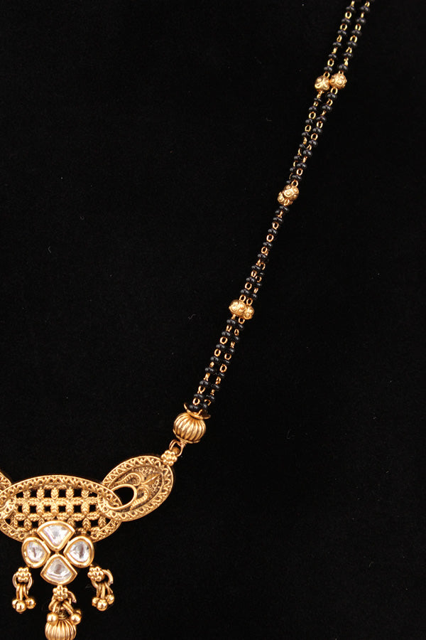 Mangalsuta With Kundan And Gold Plated Also Matching Earrings With Beads Attached (MS011)