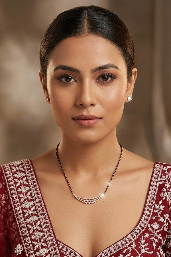 Mangalsutra In Rose Gold Polish With American Diamonds And Small Tops