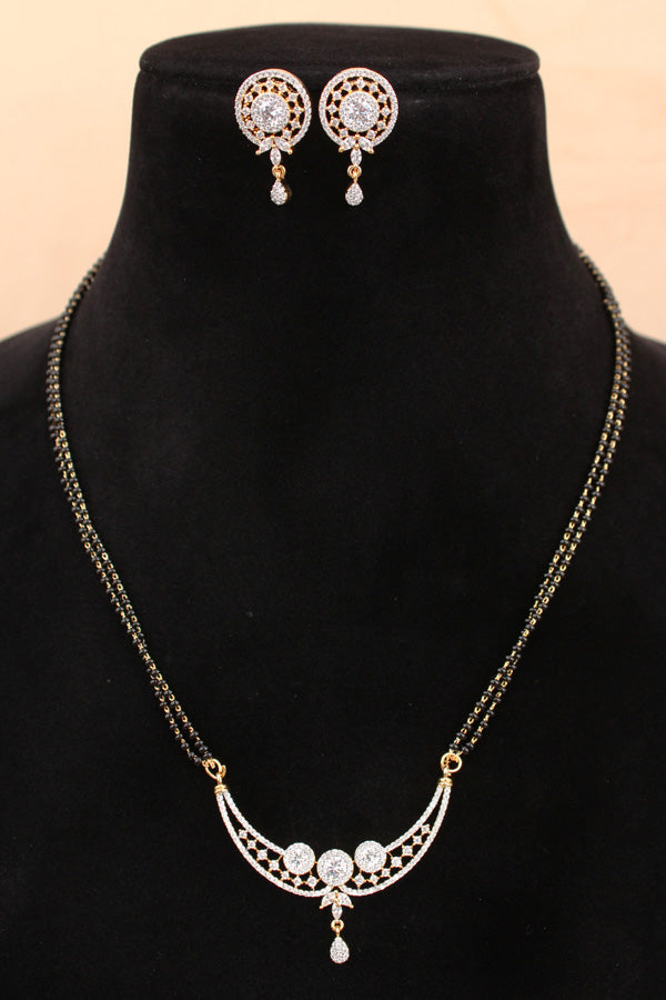 Mangalsutra With Gold Plating American Diamonds And Center Pendant With Stones Also Matching Small Studs (MS017-G)