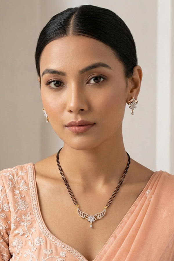 Mangalsutra In Gold Polish With American Diamonds And Small Earrings