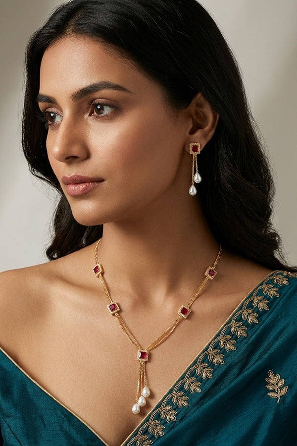 Simple And Elegant Pendant Set With Red Stones And White Pearls Attached Also Matching Earrings 