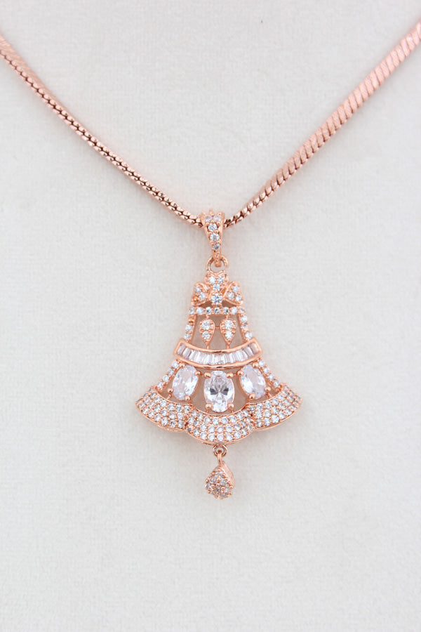 Pendant Set In Rose Gold Polish And A Small Bell Pendant And Small Matching Earrings (PS005)