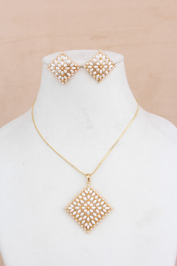 Pendant Set In Gold Polish With White Pearls Attached And Matching Earrings (PS011)
