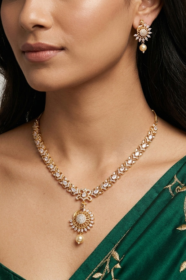 Premium Quality Gold Polish Pendant Set With American Diamonds And Matching Earrings